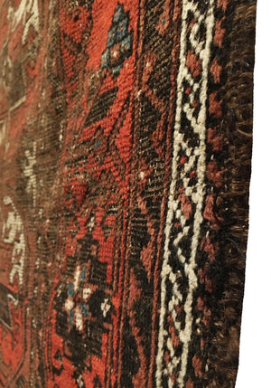 4' X 6'6" Antique Distressed Baluch Long Rug